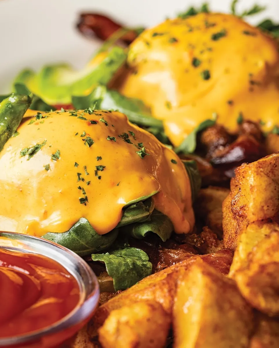 Bacon and avocado benedict